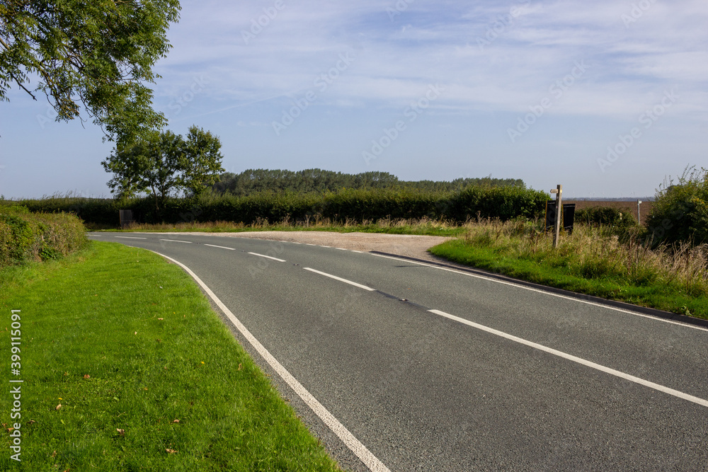 Looking North along the A18 road near Wyham in Lincolnshire, England, UK.