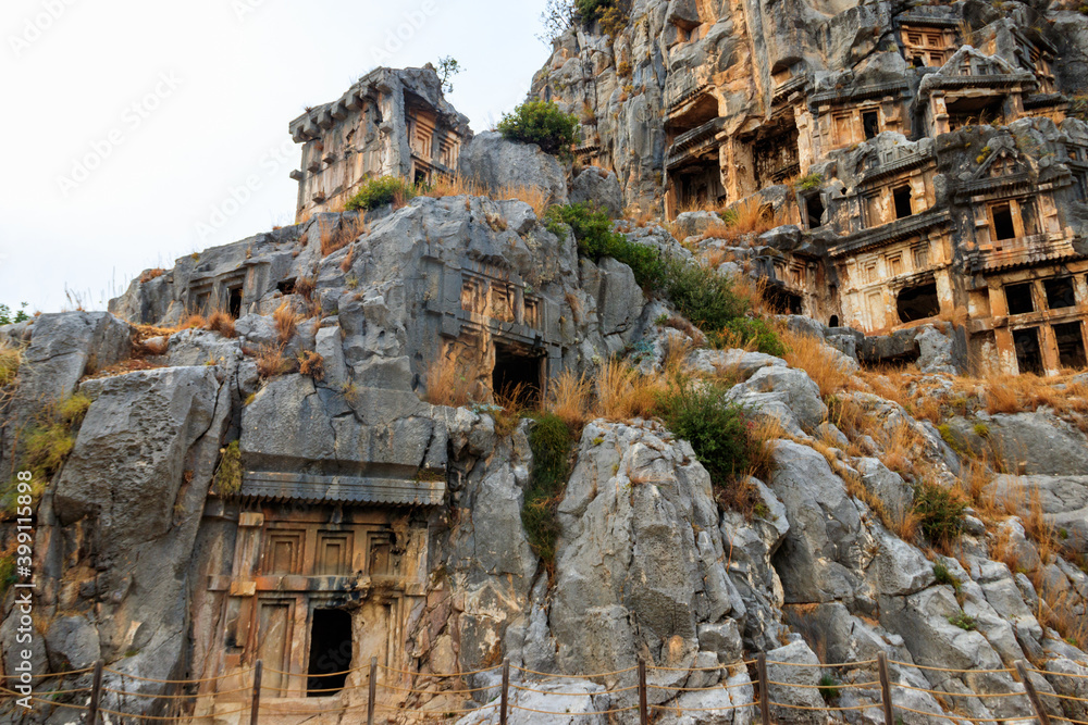 Rock-cut tombs of Lycian necropolis of the ancient city of Myra in Demre, Antalya province in Turkey Rock-cut tombs of Lycian necropolis of the ancient city of Myra in Demre, Antalya province in Turkey