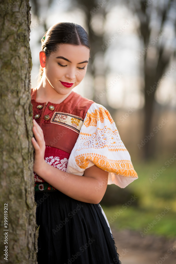 Young beautiful slovak woman in traditional dress. Slovak folklore Young beautiful slovak woman in traditional dress. Slovak folklore