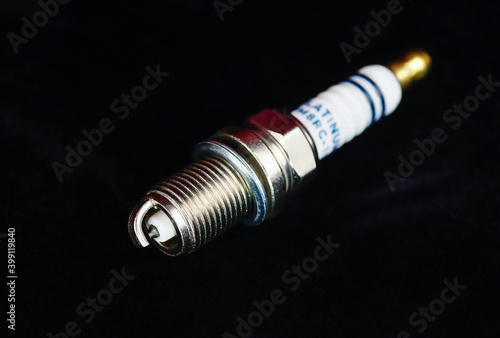 Spark plugs on black background, new spark plugs are not used.
