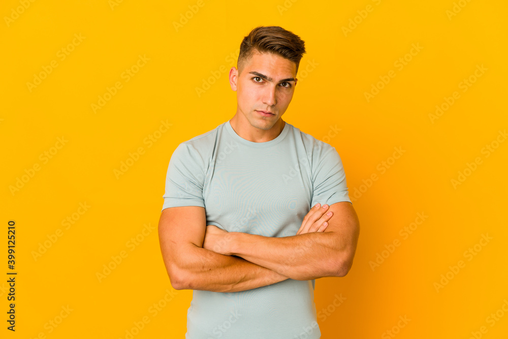 Young handsome caucasian man isolated who is bored, fatigued and need a relax day. Young handsome caucasian man isolated who is bored, fatigued and need a relax day.