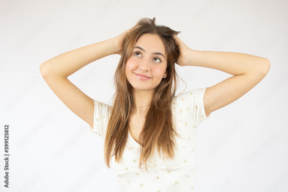 Young beautiful woman wearing sweater over white isolated background Hugging oneself happy and positive, smiling confident. Self love and self care Young beautiful woman wearing sweater over white isolated background Hugging oneself happy and positive, smiling confident. Self love and self care
