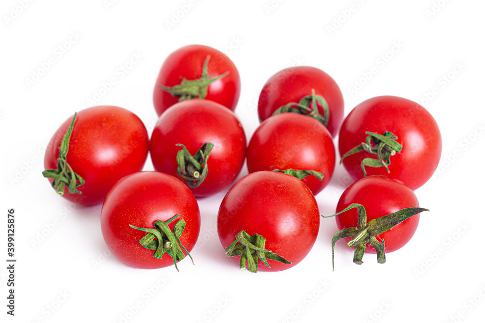 Small red cherry tomatoes with green cuttings Small red cherry tomatoes with green cuttings