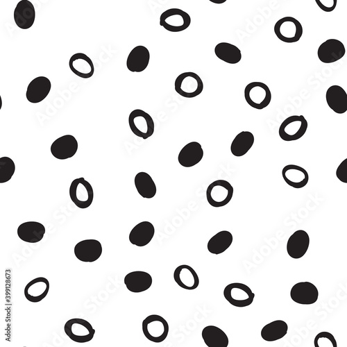 Doodle dots seamless pattern. Hand drawn circles background. Monochrome texture.