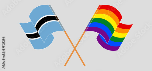 Crossed and waving flags of Botswana and LGBTQ