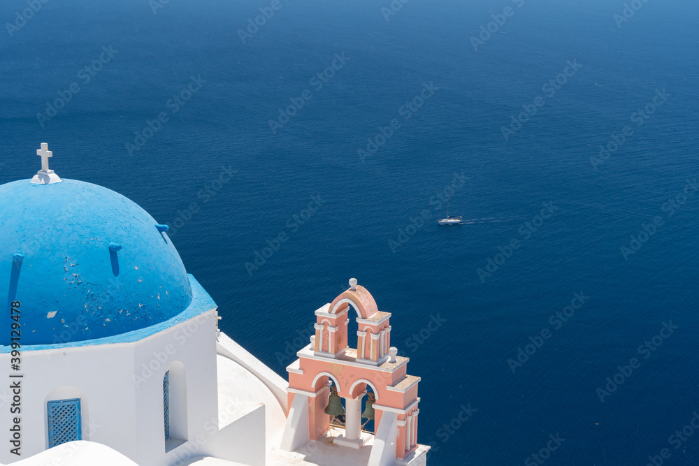 Fototapeta premium Architecture and landscape of the Santorini island., famous luxury travel vacation getaway. Oia white village with Blue Domes and mills. Amazing warm sunny day