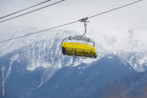 Cable car against the background of mountains. Ski resort. © MARGARITA 18
