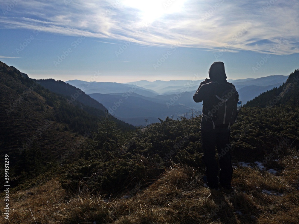 Silhouette of a person in the mountains  