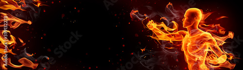 Muay thai boxer punching. Burning background with copy space, fire, smoke and sparks