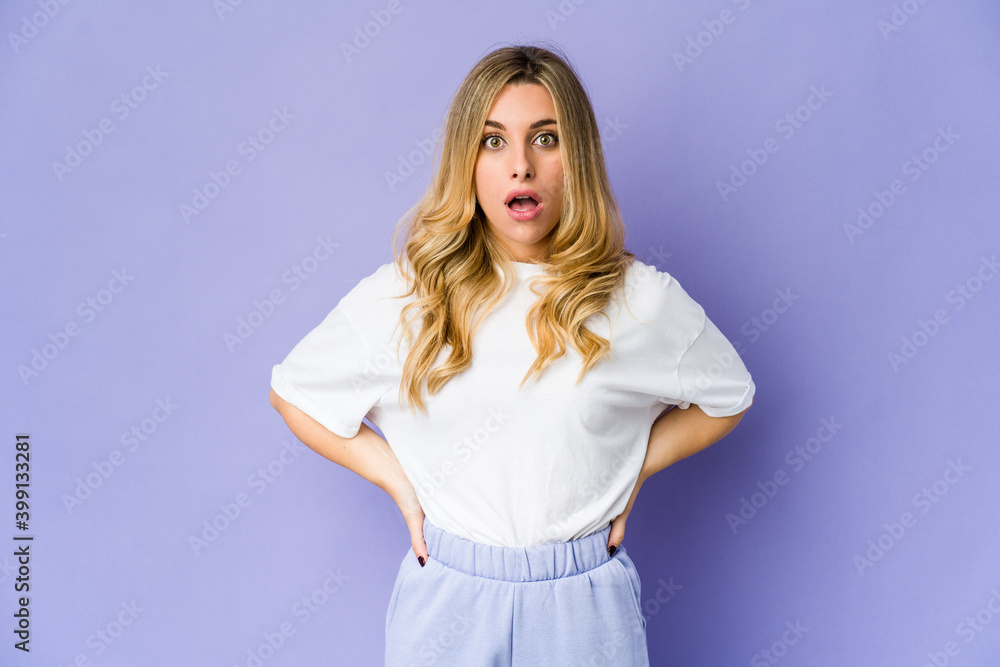 Young caucasian blonde woman being shocked because of something Young caucasian blonde woman being shocked because of something