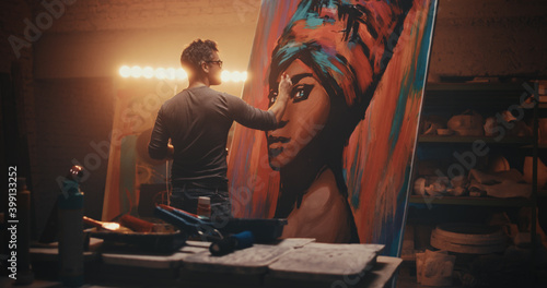 Man creating portrait of black woman