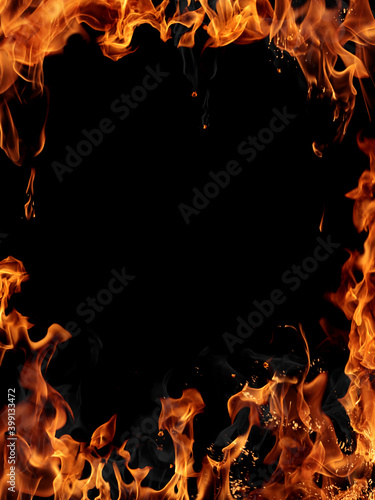 Texture of real fire flames and sparks isolated on black background