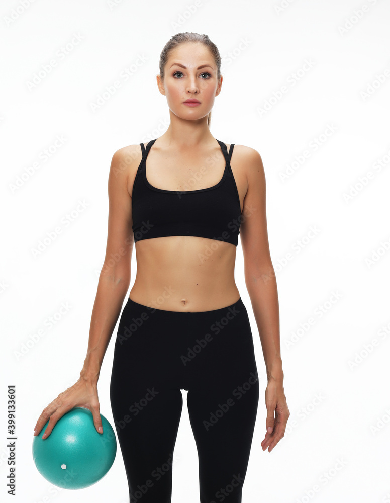 Young fit adult woman doing yoga exercise workout with gymnastics ball. Young fit adult woman doing yoga exercise workout with gymnastics ball.