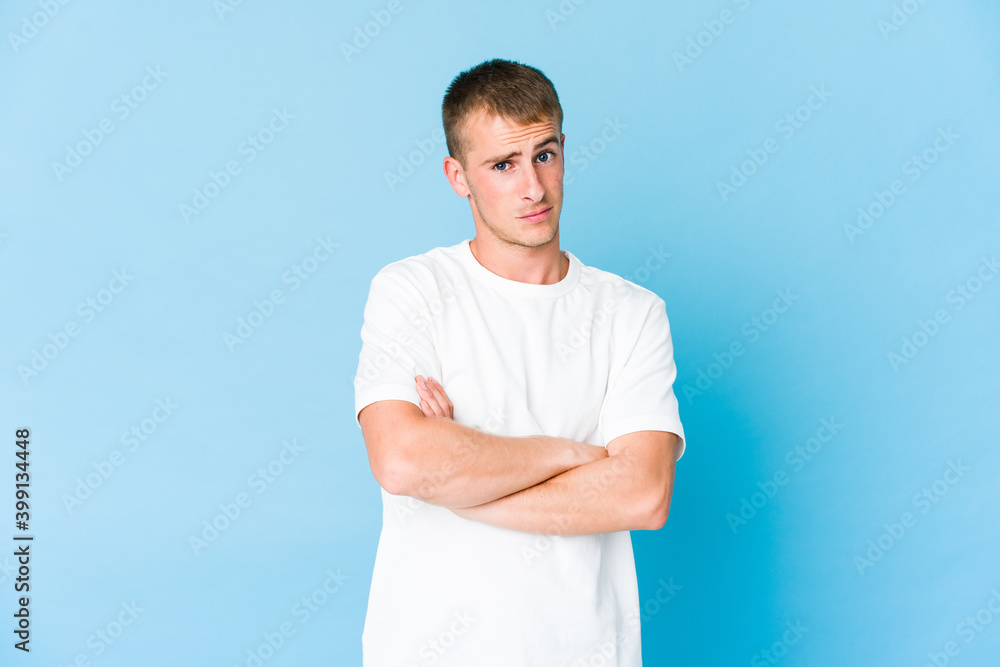 Young caucasian handsome man unhappy looking in camera with sarcastic expression. Young caucasian handsome man unhappy looking in camera with sarcastic expression.