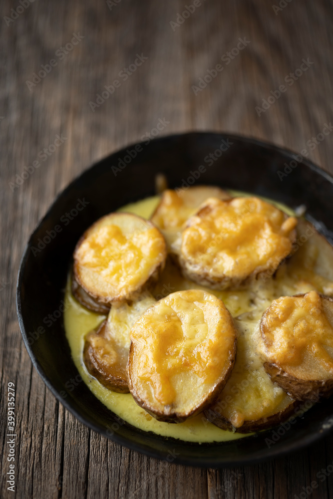 rustic spanish fried potatoes patatas bravas with cheese rustic spanish fried potatoes patatas bravas with cheese