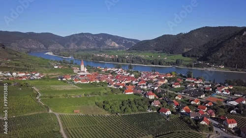 Aerial panorama of Weisenkirchen in der Wachau town and vineyards. Wachau valley, Austria photo