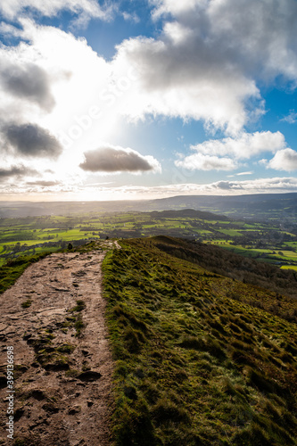 Portrait view of Skirrid Fawr downlards path in the Welsh countryside. photo