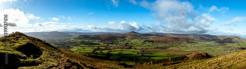 Panoramic shot of Sugar loaf in the distance with beautiful welsh scenary around it taken from skirrid fawr south wales uk.