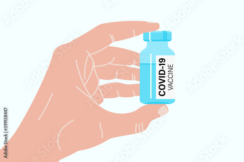 Hand holding antiviral covid 19 vaccine. Covid or coronavirus vaccination