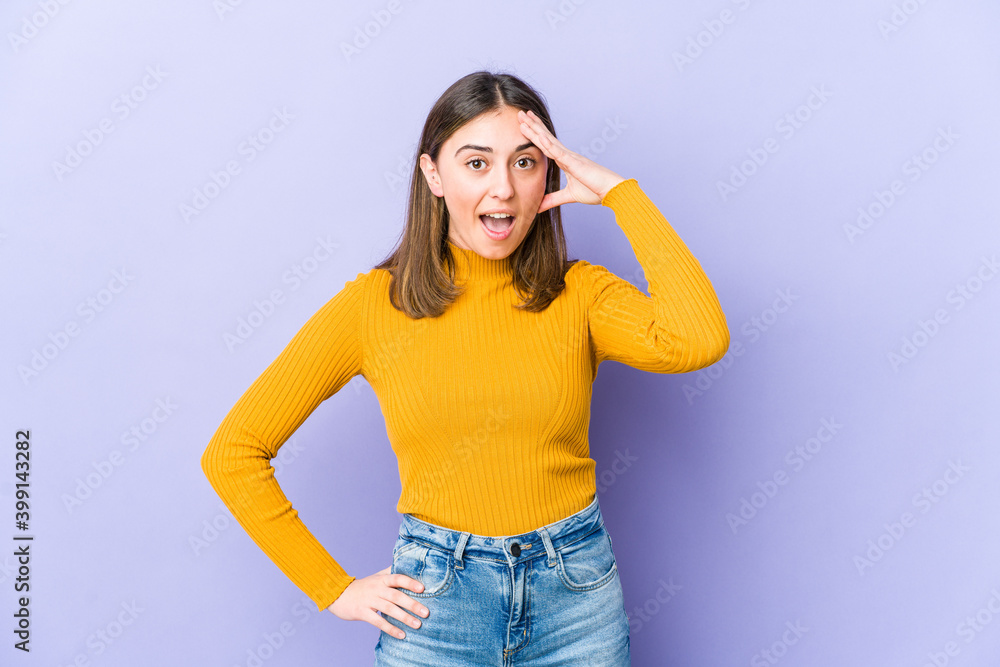 Young caucasian woman shouts loud, keeps eyes opened and hands tense. Young caucasian woman shouts loud, keeps eyes opened and hands tense.
