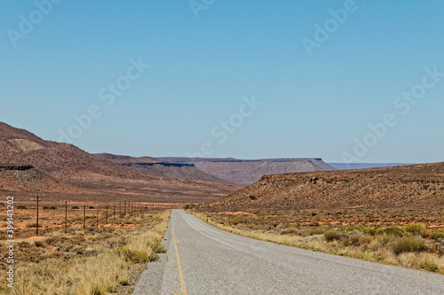 Straight road through flat topped hills in Karoo