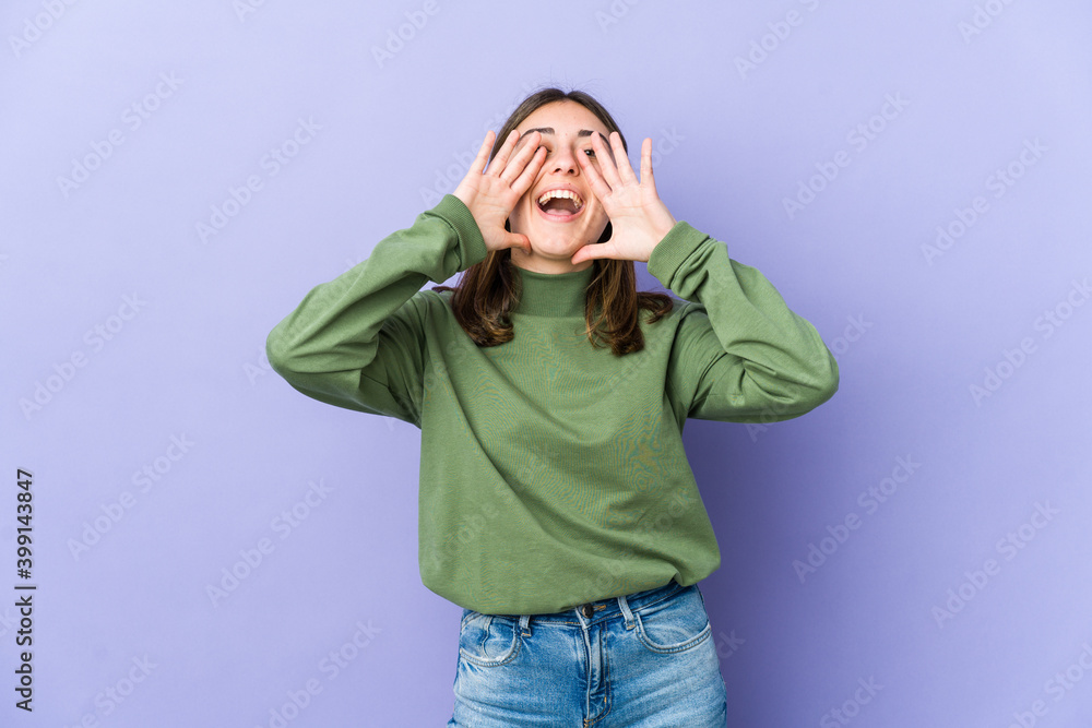 Young caucasian woman shouting excited to front. Young caucasian woman shouting excited to front.