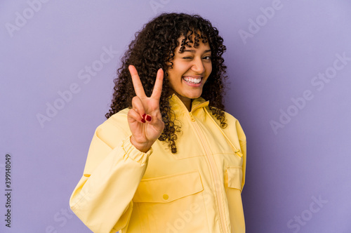 Young african american afro woman isolated showing number two with fingers.