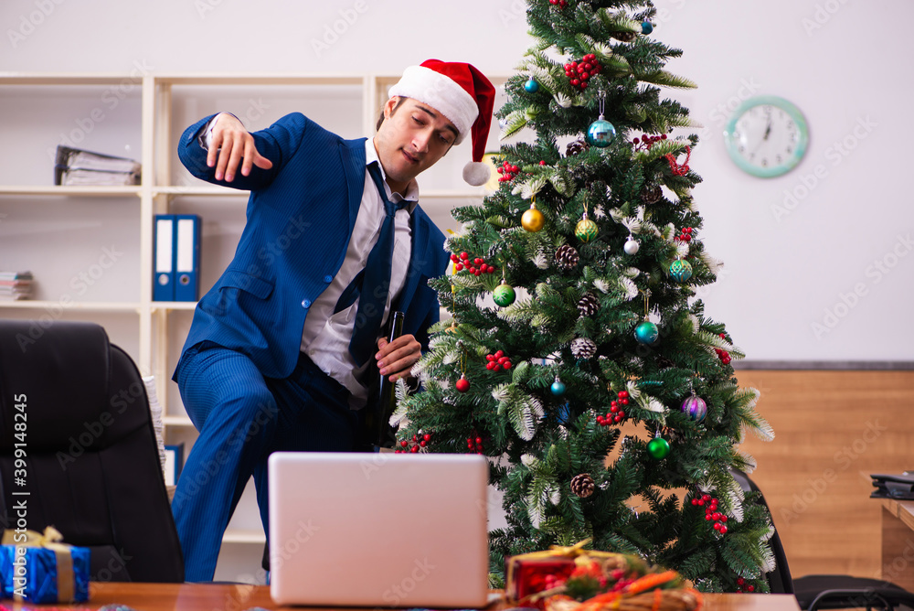Employee in the office during christmas party Employee in the office during christmas party