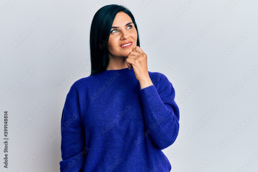 Young caucasian woman wearing casual clothes with hand on chin thinking about question, pensive expression. smiling with thoughtful face. doubt concept. Young caucasian woman wearing casual clothes with hand on chin thinking about question, pensive expression. smiling with thoughtful face. doubt concept.