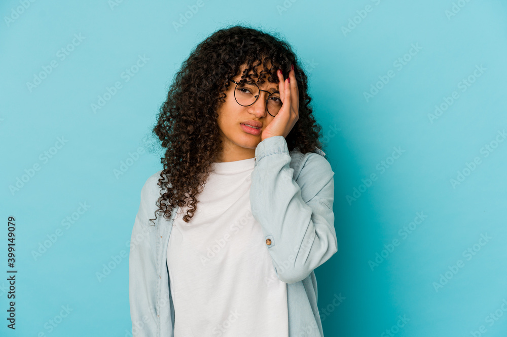 Young african american afro woman isolated tired and very sleepy keeping hand on head. Young african american afro woman isolated tired and very sleepy keeping hand on head.