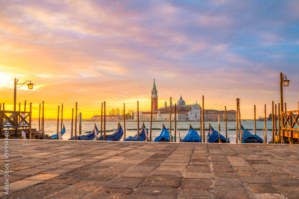 San Marco square at sunrise with San Giorgio Maggiore Island in Venice 