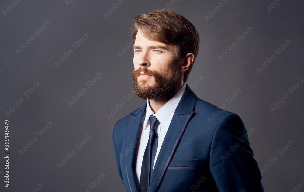 Bearded man in suit emotions gestures with hands close-up Studio Bearded man in suit emotions gestures with hands close-up Studio