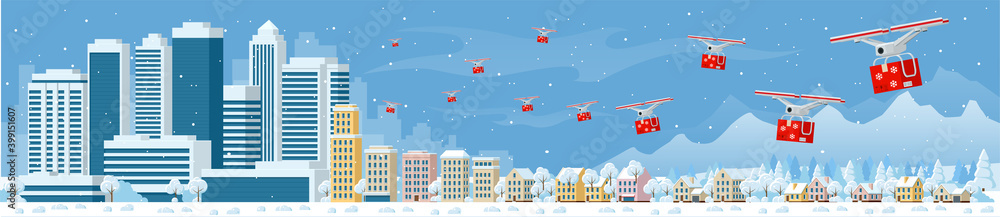 Drones with delivering Christmas gifts in the city and snow falling. Delivering by drones to home. Gifts in bright boxes. Winter city snowy downtown with skyscrapers business buildings