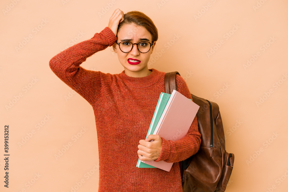 Young skinny arab student woman being shocked, she has remembered important meeting. Young skinny arab student woman being shocked, she has remembered important meeting.