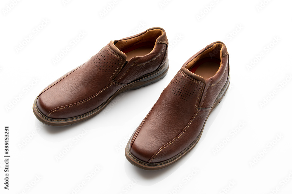 Pair of Brown Slip on Shoes Isolated on White Background