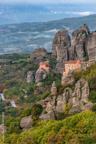 Roussanou and Αgios Nikolaos monastery, an unesco world heritage site, located on a unique rock formation above the village of Kalambaka during fall season.