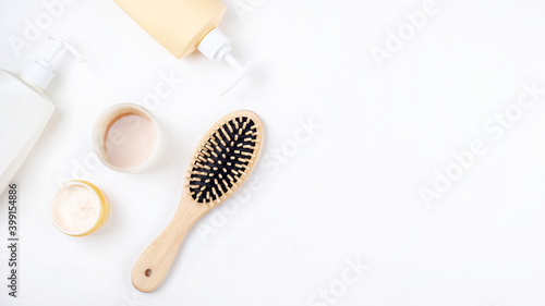 Womens haircare spa in bottle on white background top view
