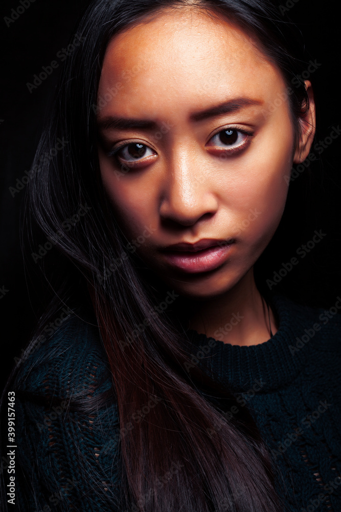 pretty young asian girl posing sensitive on black background, lifestyle people concept pretty young asian girl posing sensitive on black background, lifestyle people concept