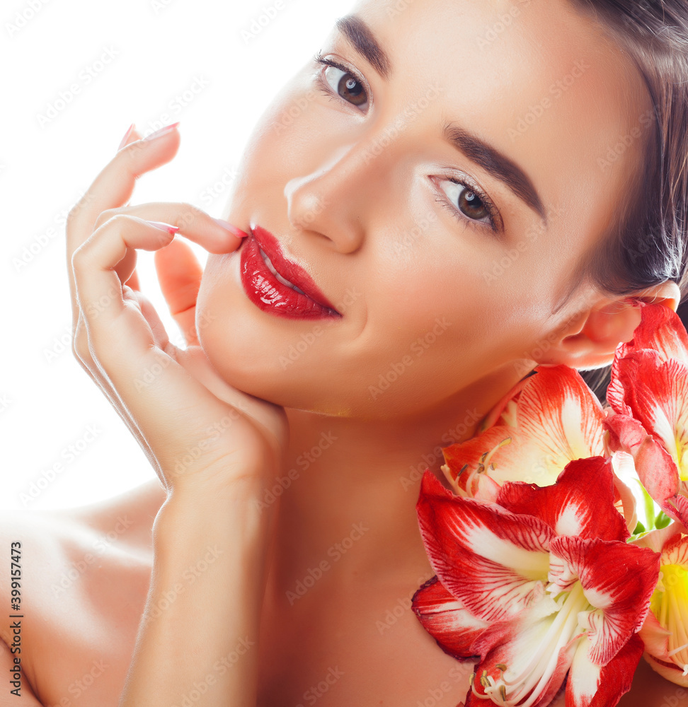 young pretty brunette real woman with red flower amaryllis close up isolated on white background. Fancy fashion makeup, bright lipstick, creative Ombre manicured nails young pretty brunette real woman with red flower amaryllis close up isolated on white background. Fancy fashion makeup, bright lipstick, creative Ombre manicured nails