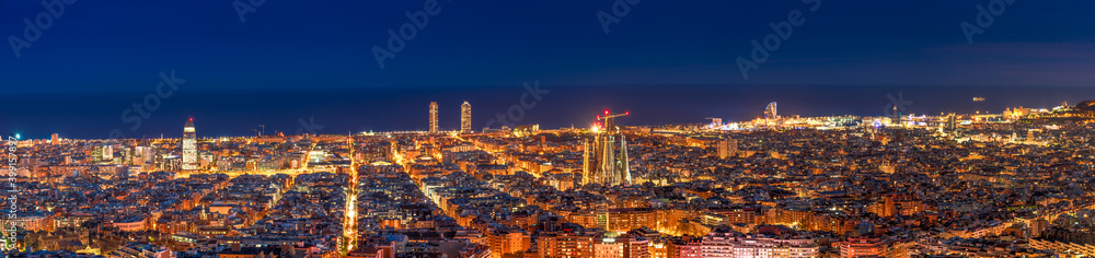Panorama of Barcelona city centre at dusk. Spain