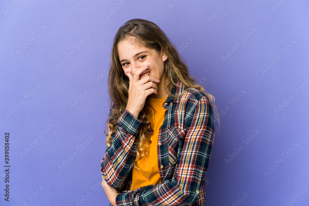 Young caucasian cute woman laughing happy, carefree, natural emotion. Young caucasian cute woman laughing happy, carefree, natural emotion.