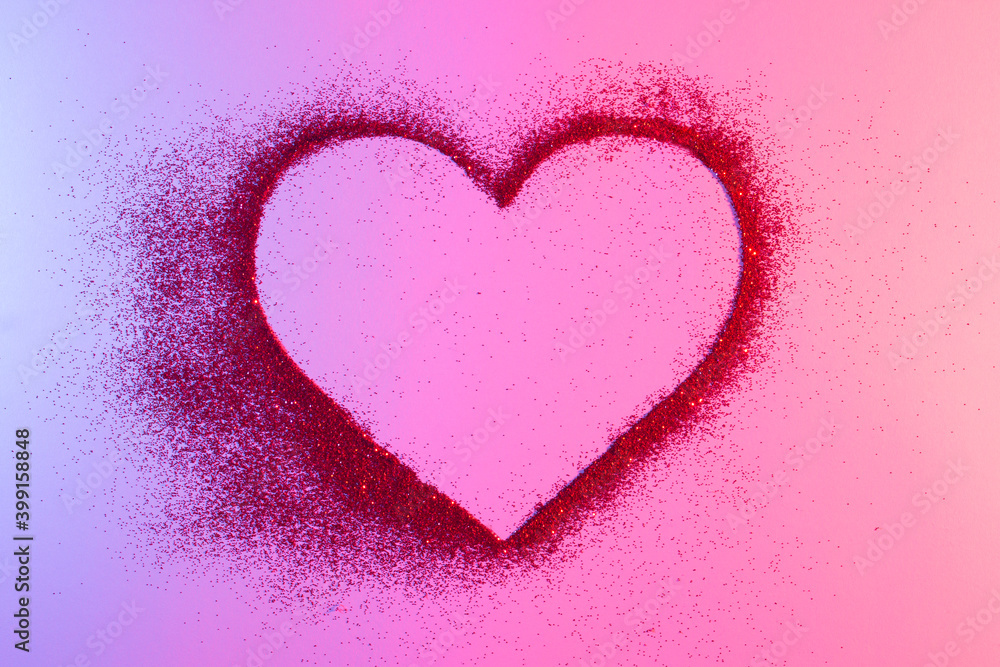 Heart of red bright sparkles in neon lights. Artistic design colorful and shiny bright background