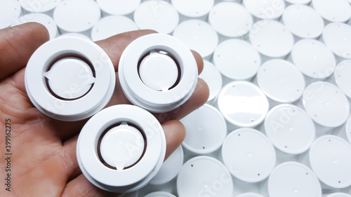 Inside- bottle cap with screw lock, used to cover parts of plastic cosmetic products, produced from the injection molding machine industry,  photo