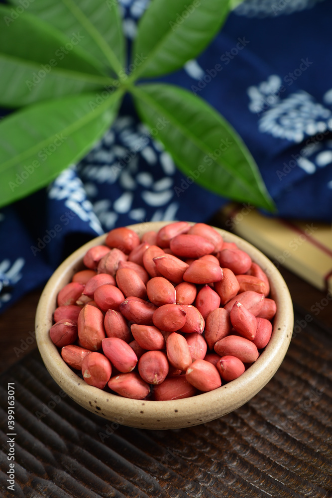 Peanuts on the background of retro Chinese style Peanuts on the background of retro Chinese style