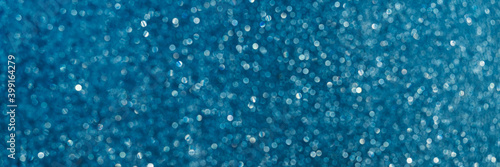 Blurred abstract glitter texture.