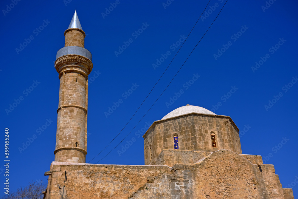 ancient mosque in Cyprus against the blue sky