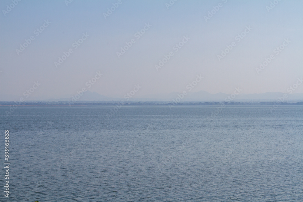 View of mountains on the water surface