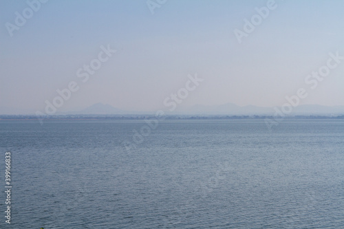 View of mountains on the water surface