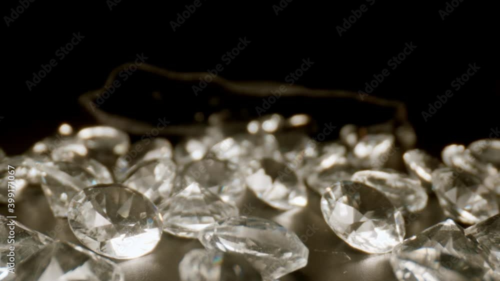 MACRO: Motion over many diamonds on black table MACRO: Motion over many diamonds on black table