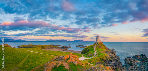 Ty Mawr Lighthouse at sunset on Llanddwyn Island in North Wales photo